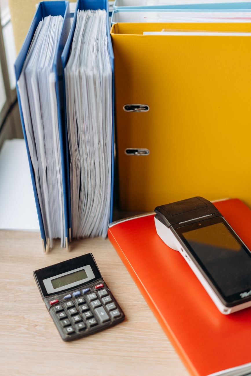 Close-up on active calculator and tax form preparation